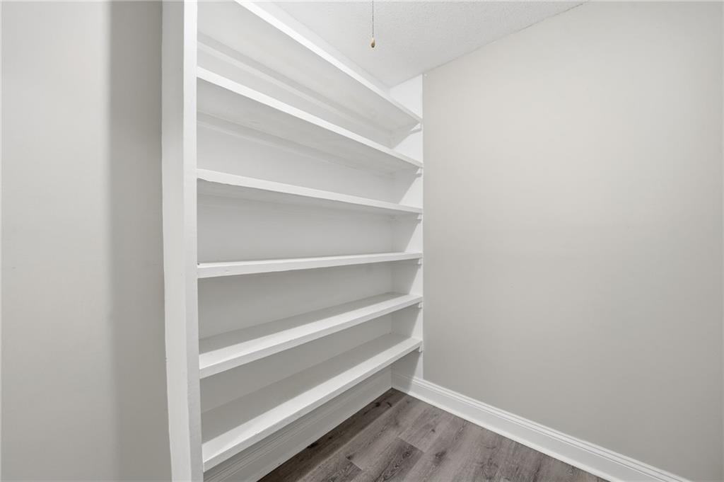 2702 Beecher Drive Austell, GA 30106 - Photo 20 of 27 a view of walk in closet with empty racks