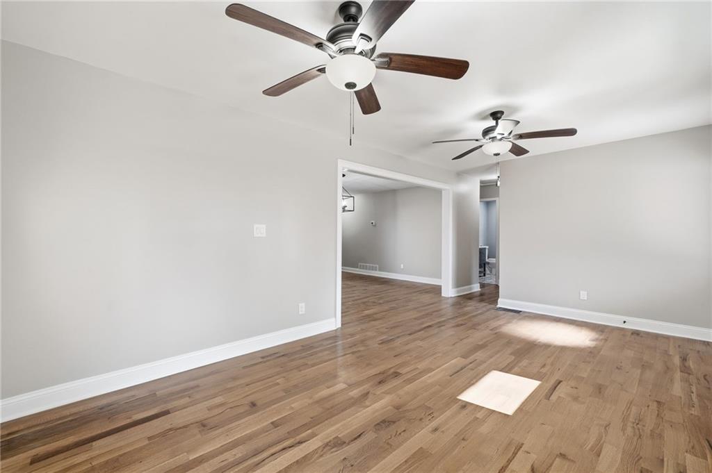 2702 Beecher Drive Austell, GA 30106 - Photo 5 of 27 a view of empty room with wooden floor