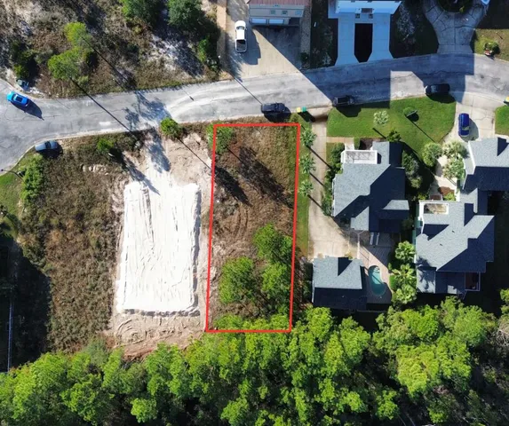 an aerial view of house with yard