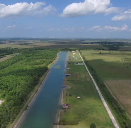 a view of swimming pool from a balcony