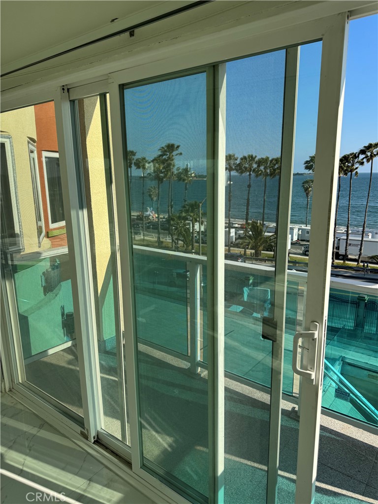2230 East Ocean Boulevard, Unit 9 Long Beach, CA 90803 - Photo 14 of 16 a bathroom with a glass door