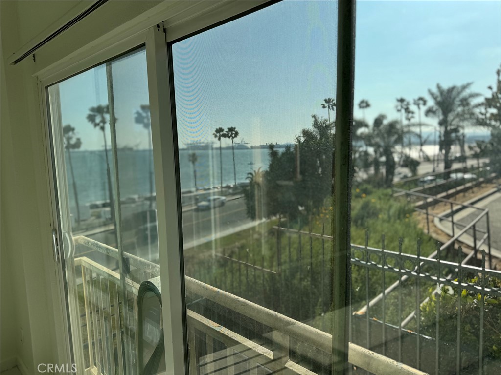 2230 East Ocean Boulevard, Unit 9 Long Beach, CA 90803 - Photo 7 of 16 a bathroom with a glass shower door