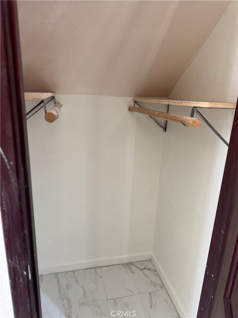 2230 East Ocean Boulevard, Unit 9 Long Beach, CA 90803 - Photo 10 of 16 a view of a room with racks on the wall