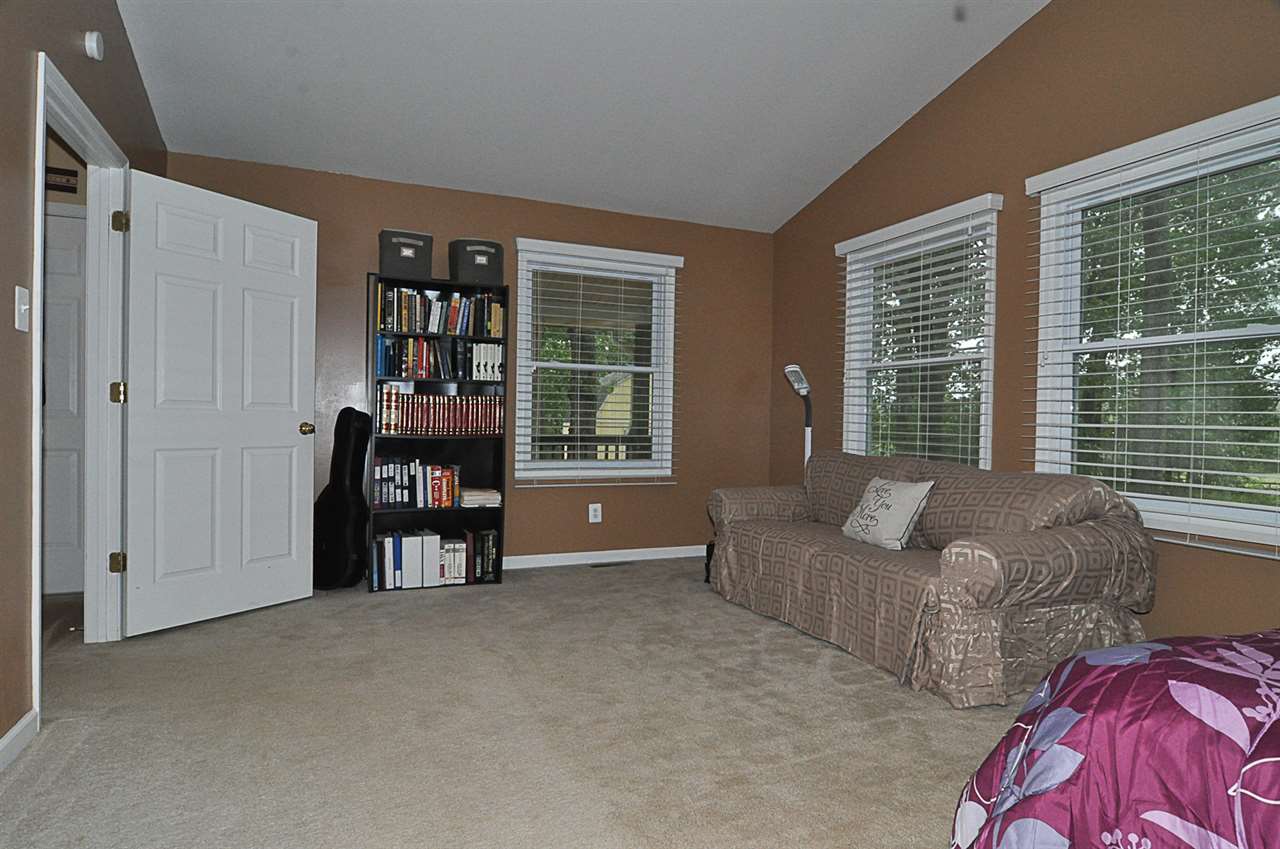 756 Advance Mills Road Ruckersville, VA 22968 - Photo 23 of 29 a living room with furniture and a large window