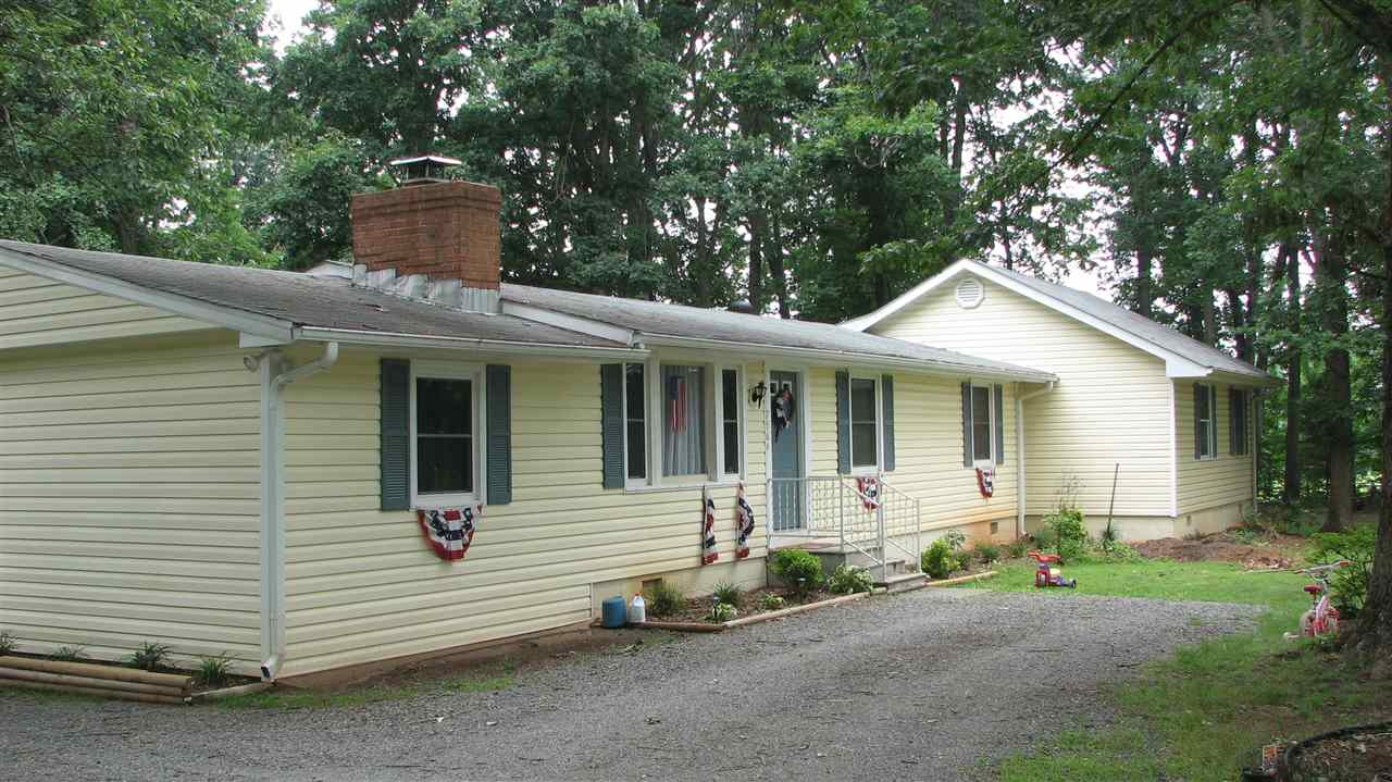 756 Advance Mills Road Ruckersville, VA 22968 - Photo 4 of 29 a view of a house with a yard