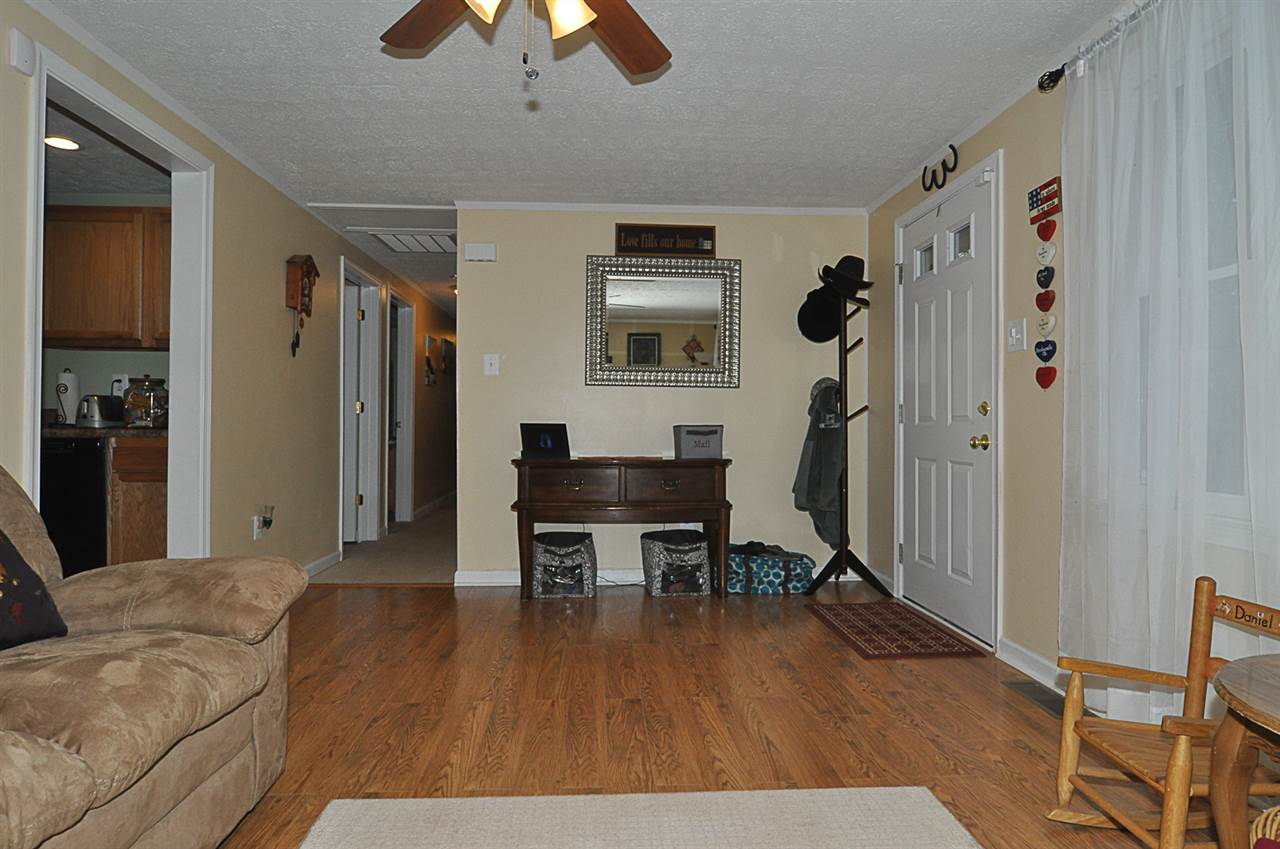 756 Advance Mills Road Ruckersville, VA 22968 - Photo 9 of 29 a living room with furniture and a wooden floor