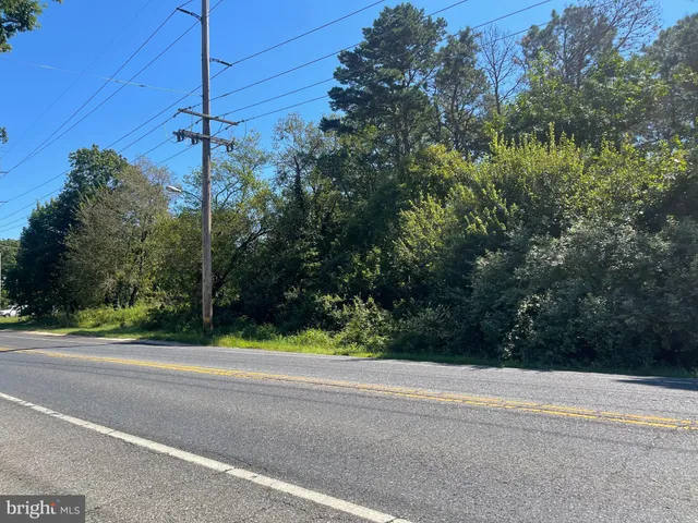 a view of a house with a street