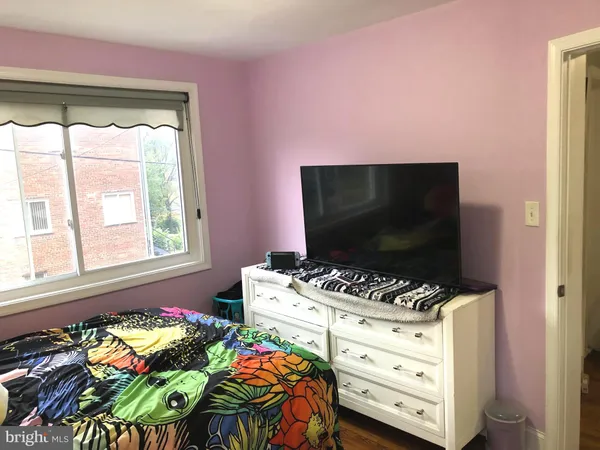 a room with toys and a flat screen tv