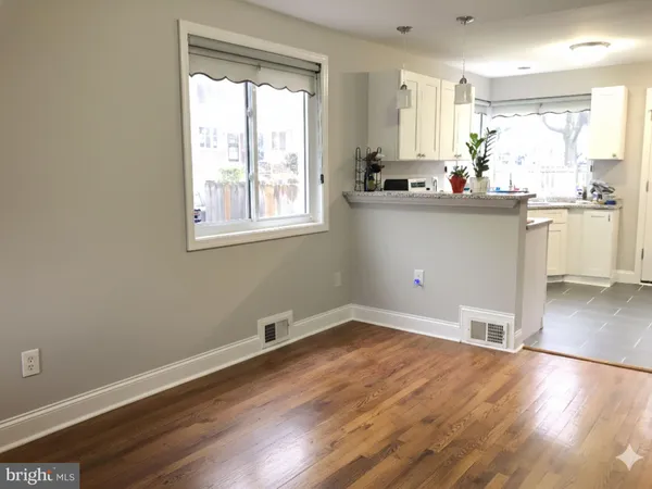 a kitchen with a sink and window