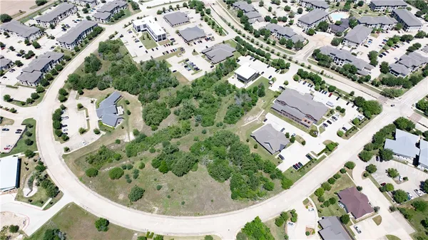 an aerial view of residential building and lake view