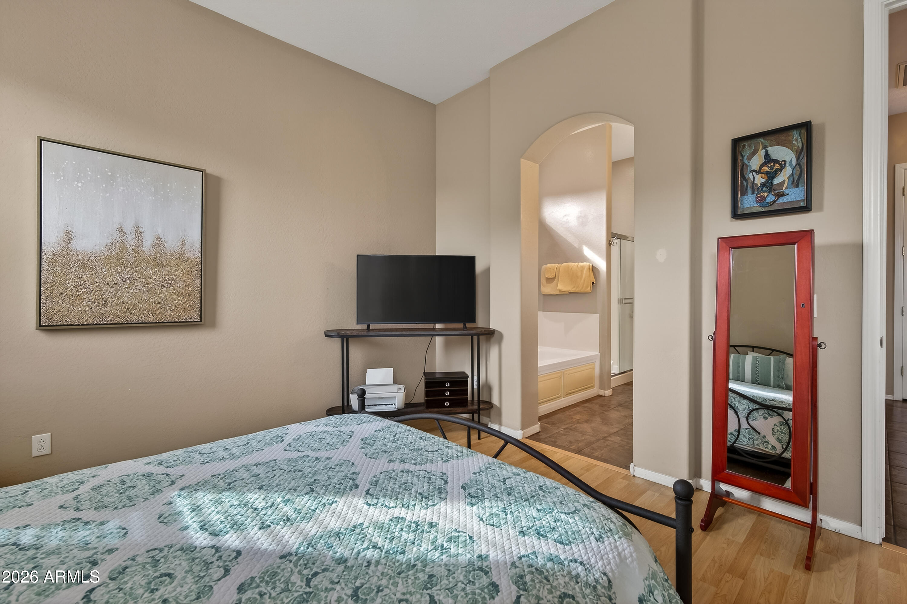 654 South Elk Ridge Drive Camp Verde, AZ 86322 - Photo 21 of 34 a bedroom with a bed and a flat screen tv