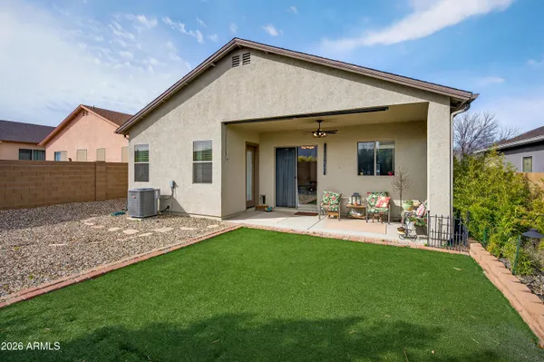a view of a backyard with a garden and plants