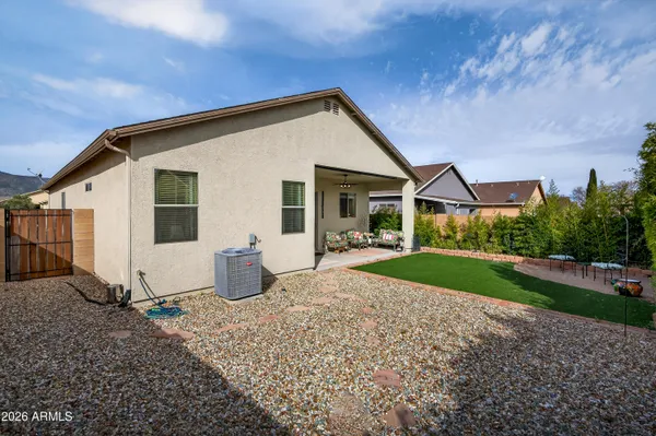 a view of a house with backyard