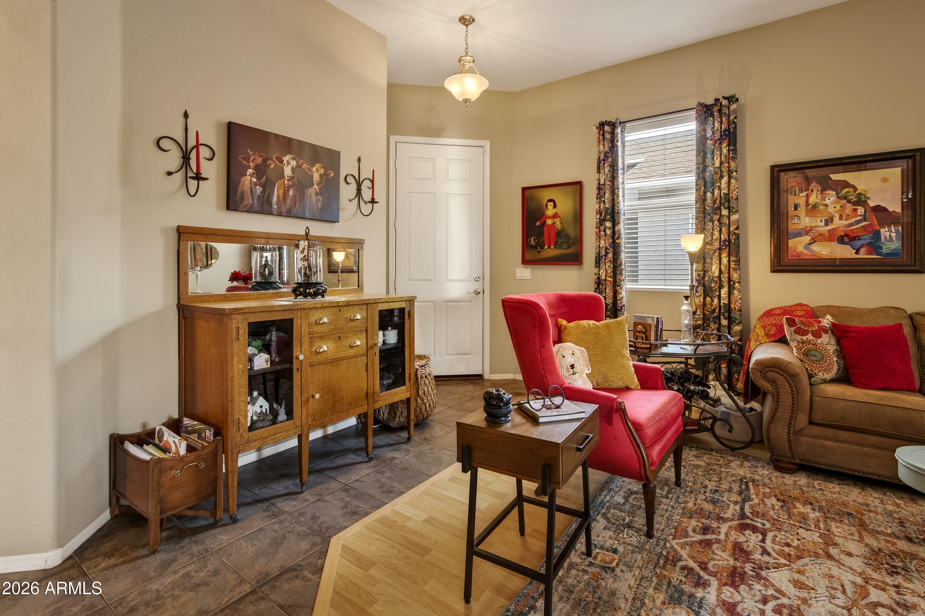 654 South Elk Ridge Drive Camp Verde, AZ 86322 - Photo 7 of 34 a livingroom with workspace couch and a window