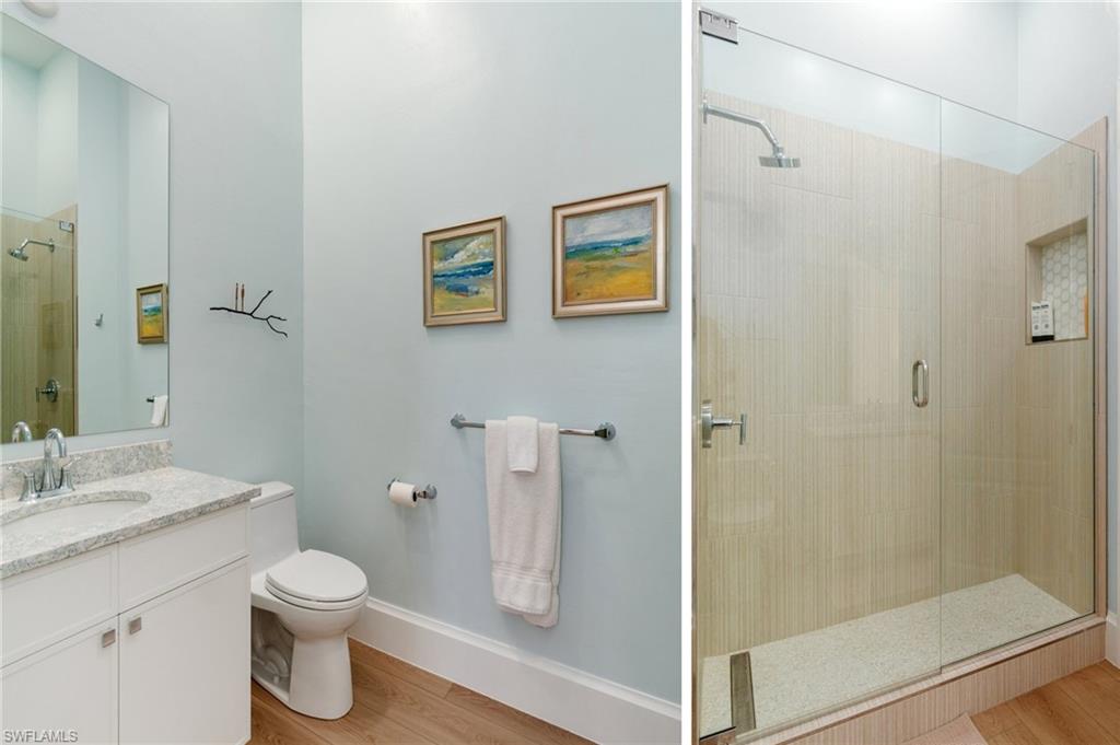 17010 Porta Vecchio Way, Unit 201 Naples, FL 34110 - Photo 18 of 50 a bathroom with a shower and a toilet