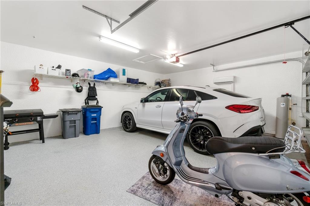 17010 Porta Vecchio Way, Unit 201 Naples, FL 34110 - Photo 20 of 50 a view of car garage