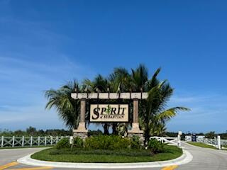 92 Jetty Lane Sebastian, FL 32958 - Photo 3 of 8 a sign board with a house in the background