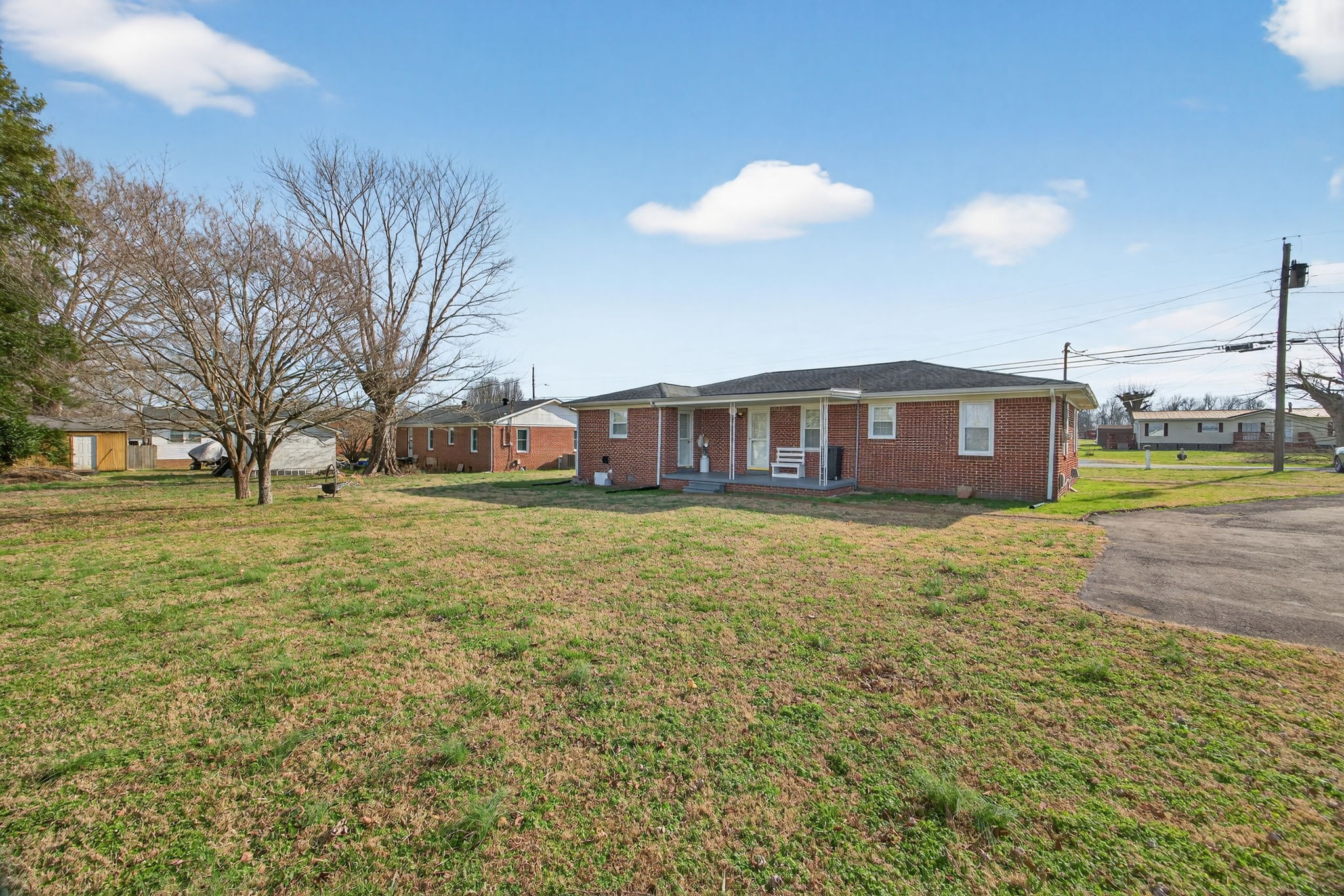 716 Dry Creek Road Smithville, TN 37166 - Photo 26 of 31 a front view of a house with a garden