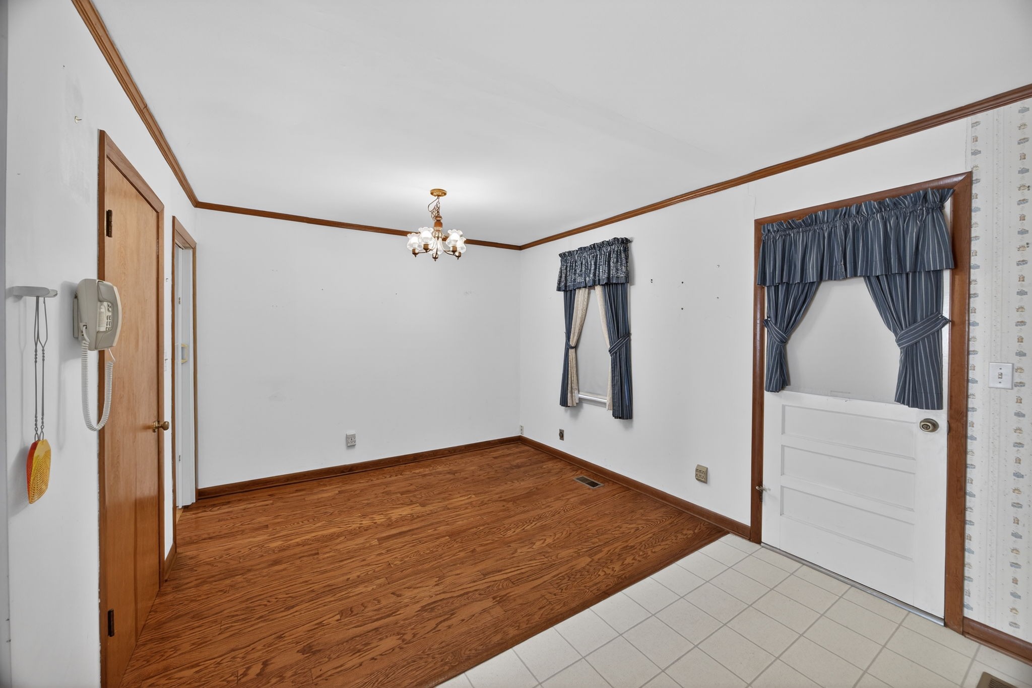 716 Dry Creek Road Smithville, TN 37166 - Photo 6 of 31 a view of empty room with wooden floor and fan