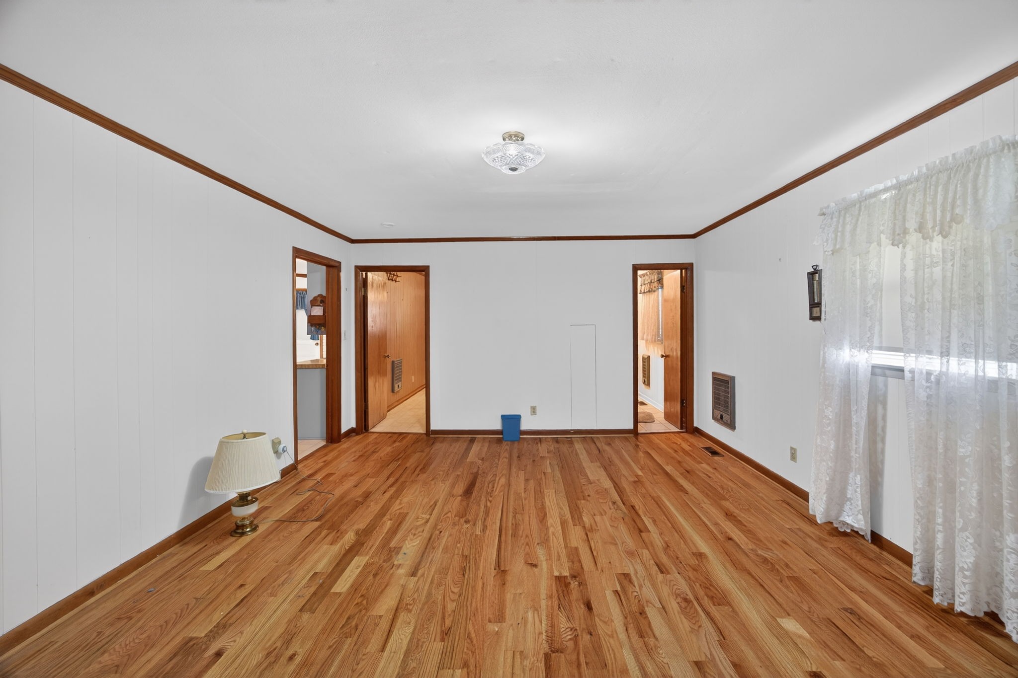 716 Dry Creek Road Smithville, TN 37166 - Photo 10 of 31 a bedroom with a large bed and a window