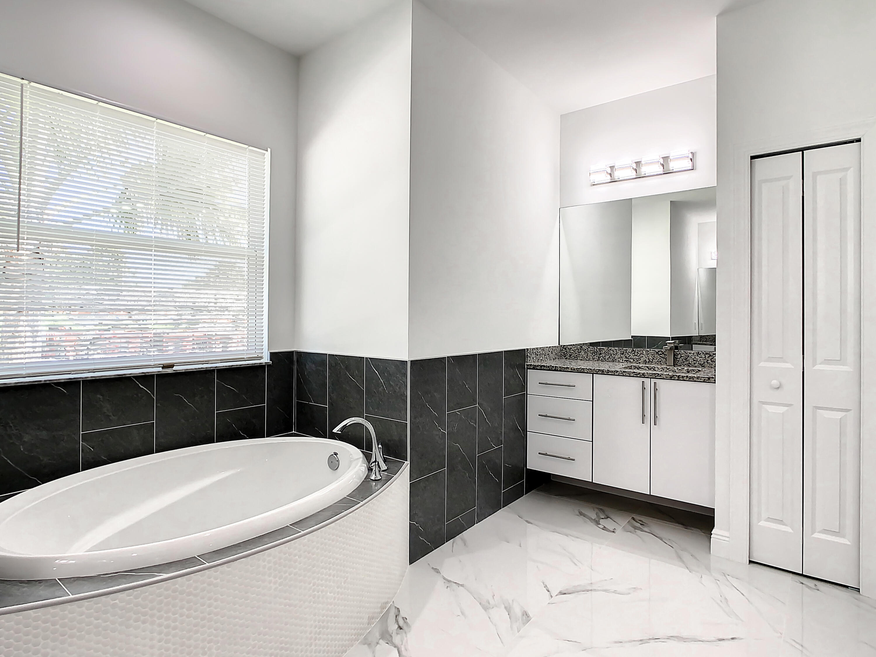 325 Southwest Becker Road Port St. Lucie, FL 34953 - Photo 17 of 31 Master Bathroom Vanity and Linen Closet
