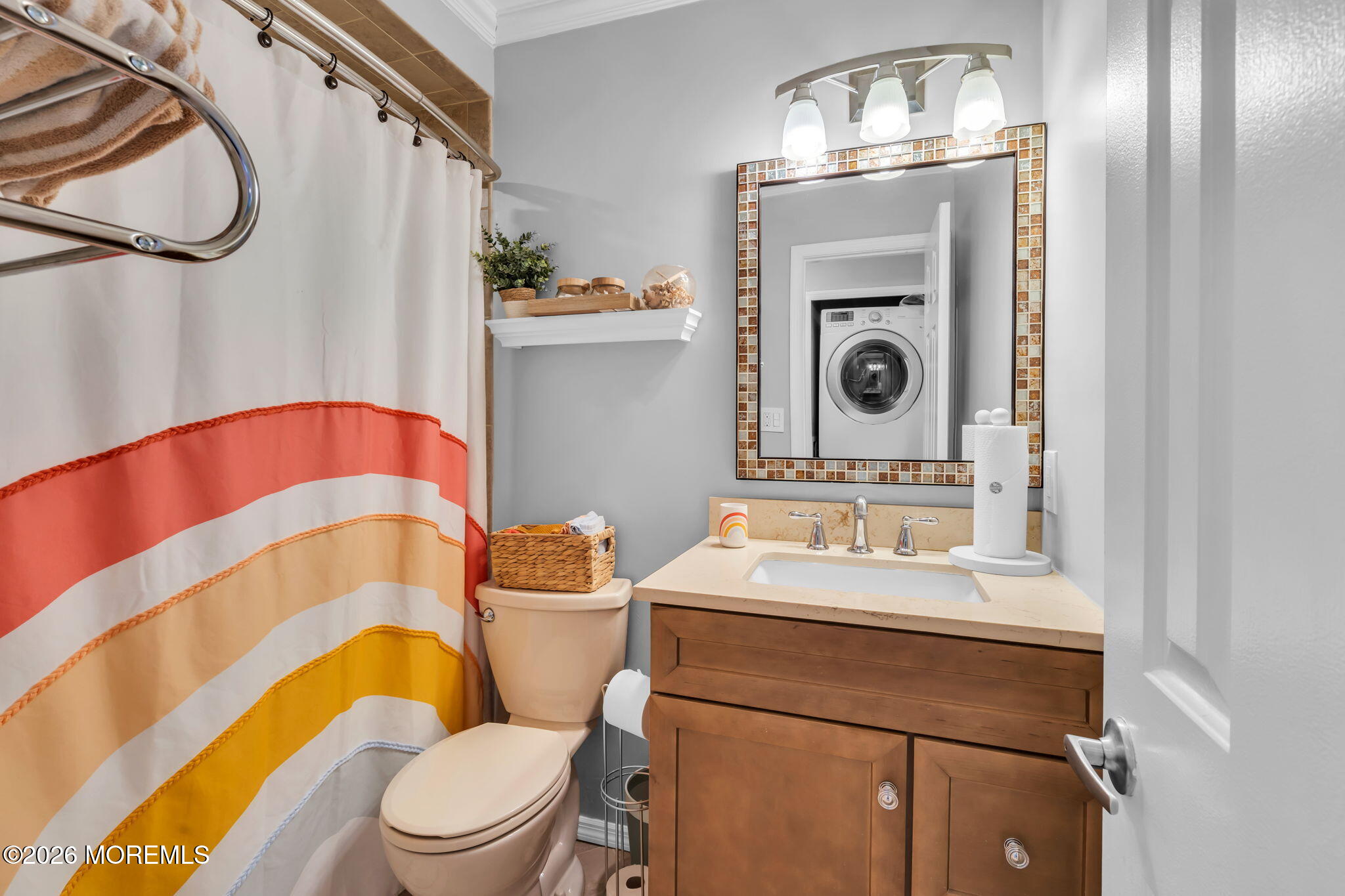 4 Duncan Way Freehold, NJ 07728 - Photo 20 of 28 a bathroom with a sink a toilet mirror vanity and shower