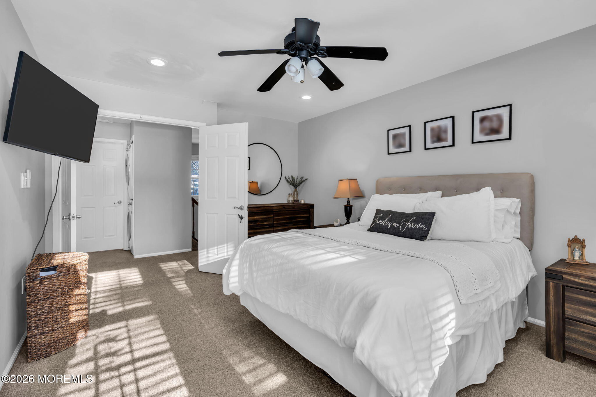 4 Duncan Way Freehold, NJ 07728 - Photo 23 of 28 a bedroom with a bed and a flat screen tv