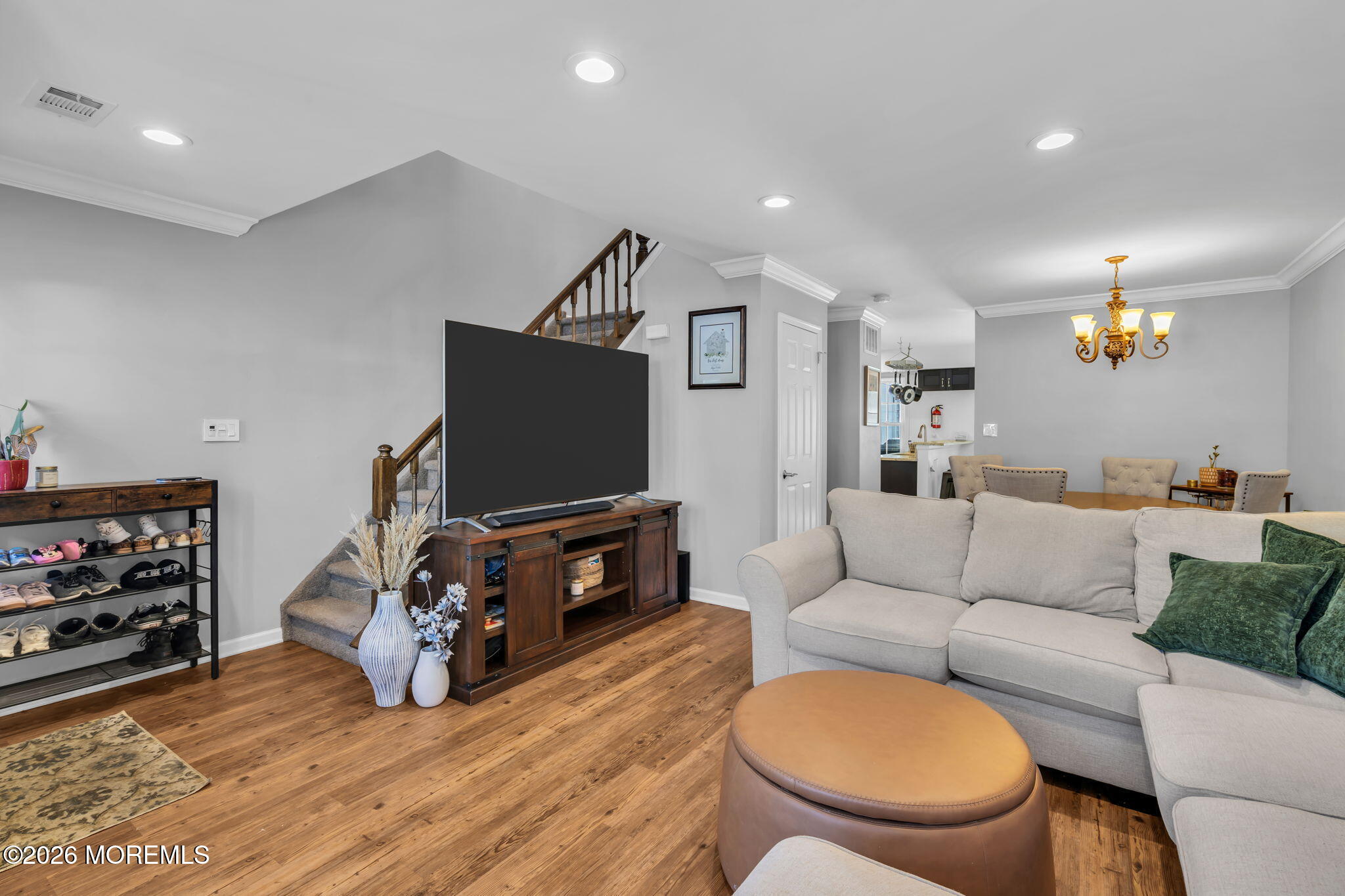 4 Duncan Way Freehold, NJ 07728 - Photo 7 of 28 a living room with furniture and a flat screen tv