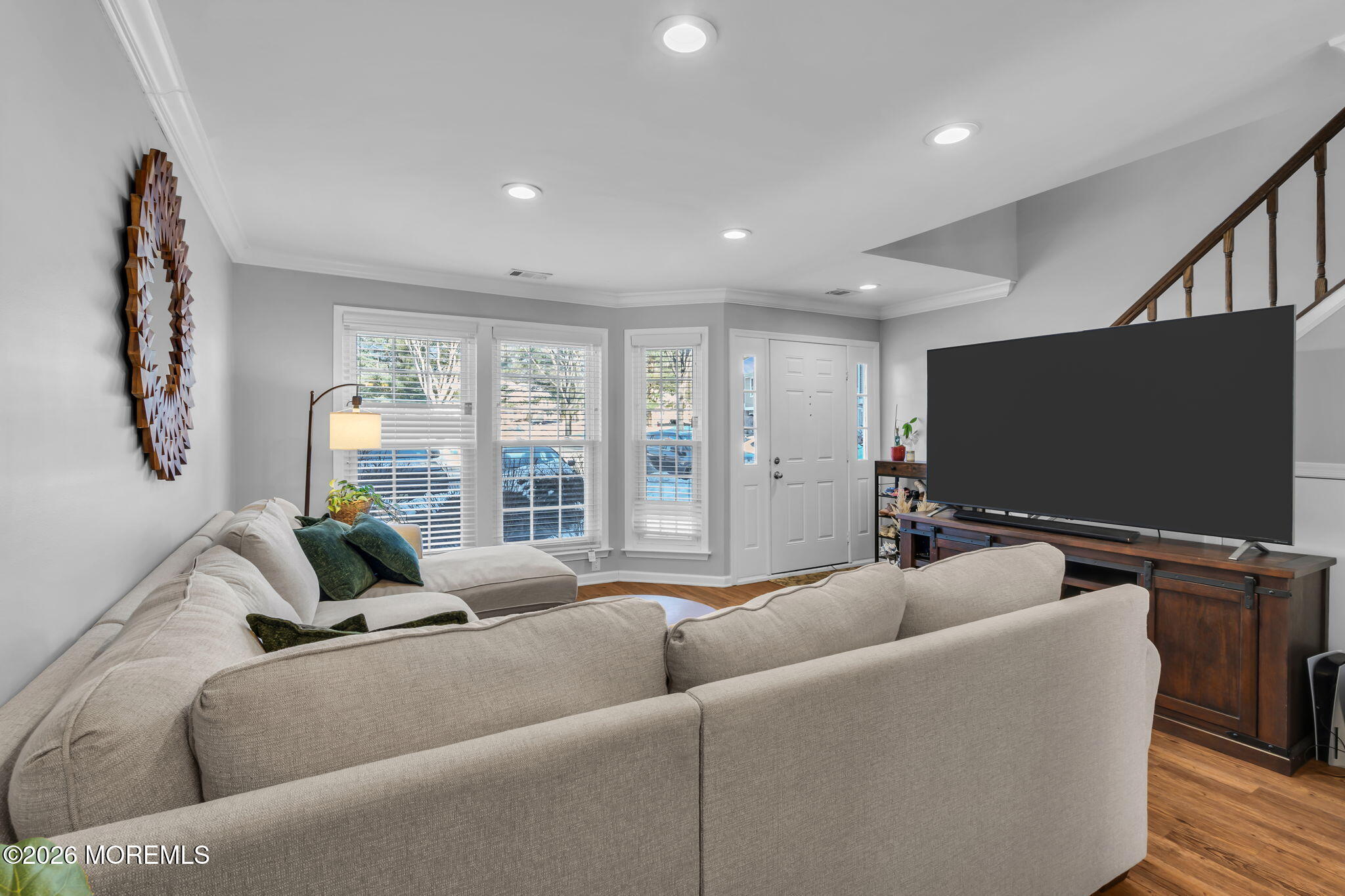 4 Duncan Way Freehold, NJ 07728 - Photo 8 of 28 a living room with furniture and a flat screen tv