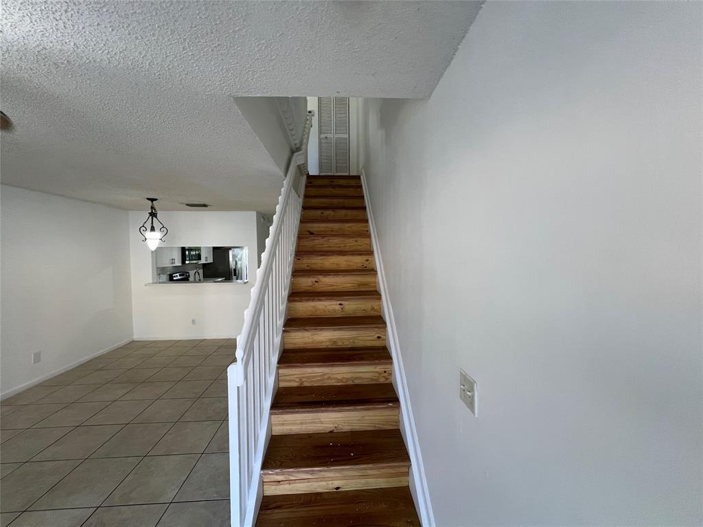 6756 Sienna Club Drive, Unit 6756 Lauderhill, FL 33319 - Photo 14 of 24 a view of entryway and hall with wooden floor