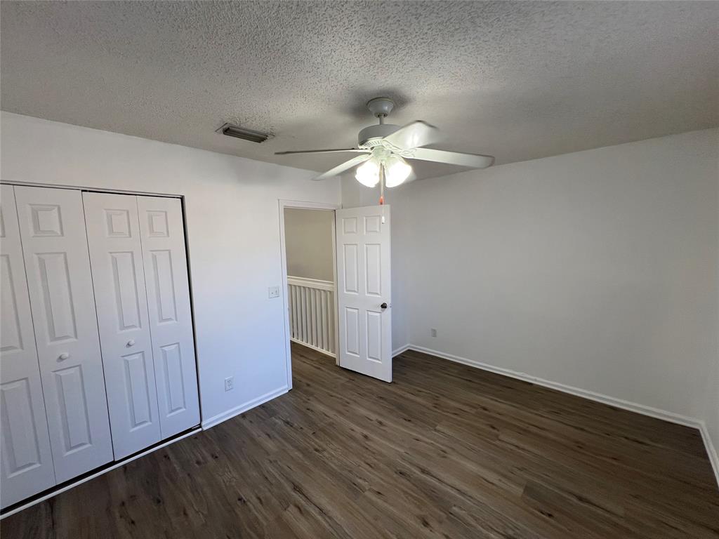 6756 Sienna Club Drive, Unit 6756 Lauderhill, FL 33319 - Photo 18 of 24 a view of an empty room with wooden floor