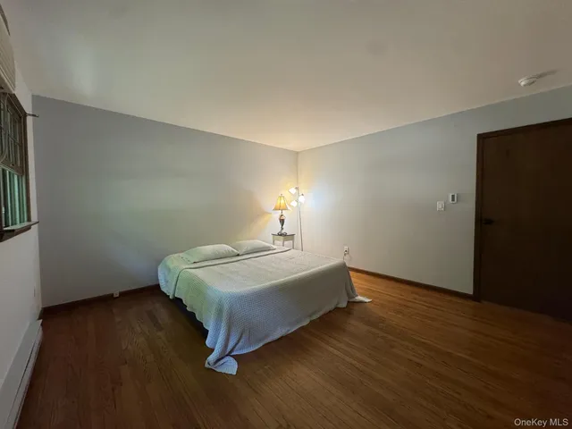 a room with toys and a wooden floor