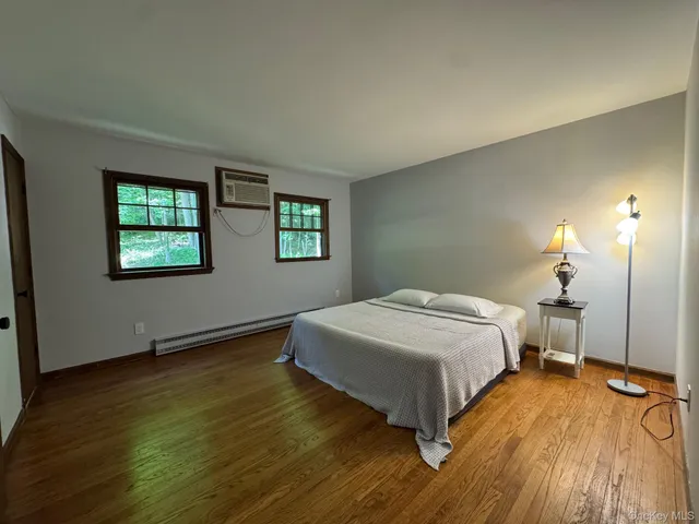 a living room with furniture and a play ground