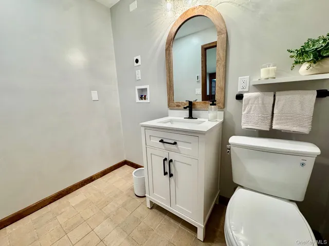 a view of a tree in a yard