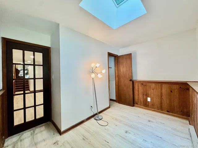 a view of a park with large trees