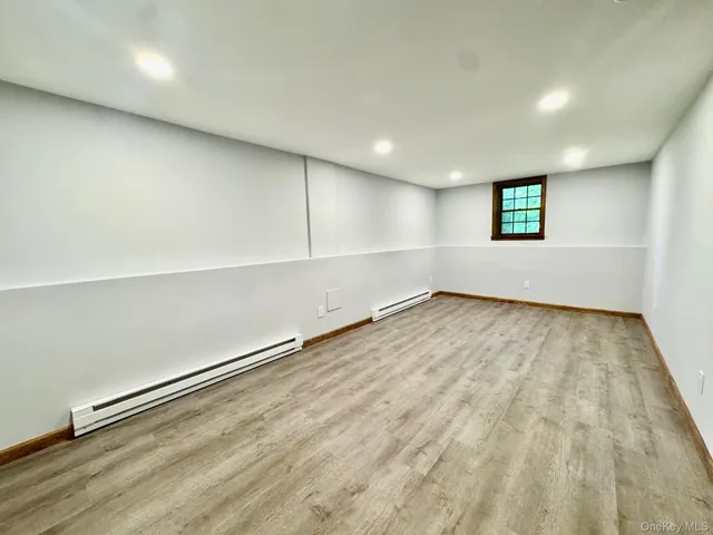an aerial view of a house with a lake view