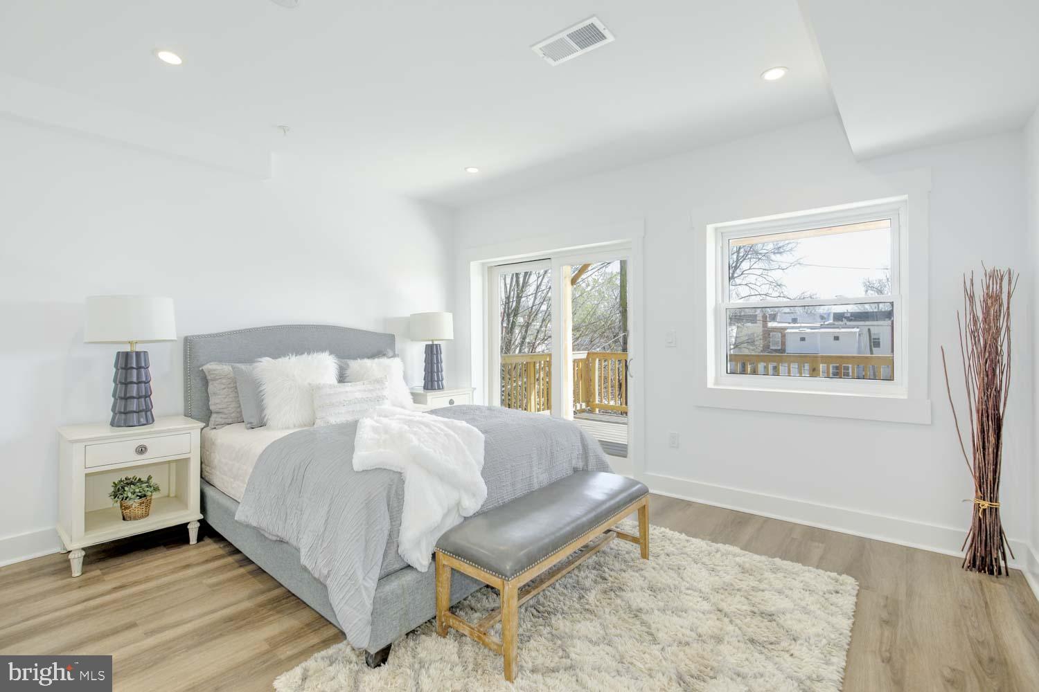 424 Taylor Street Northwest, Unit B Washington, DC 20011 - Photo 21 of 51 a bedroom with a bed and a window