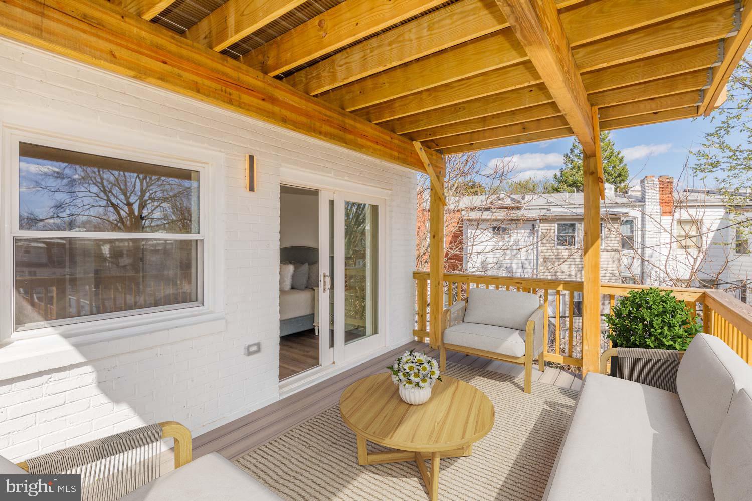 424 Taylor Street Northwest, Unit B Washington, DC 20011 - Photo 25 of 51 a living room with furniture and a window