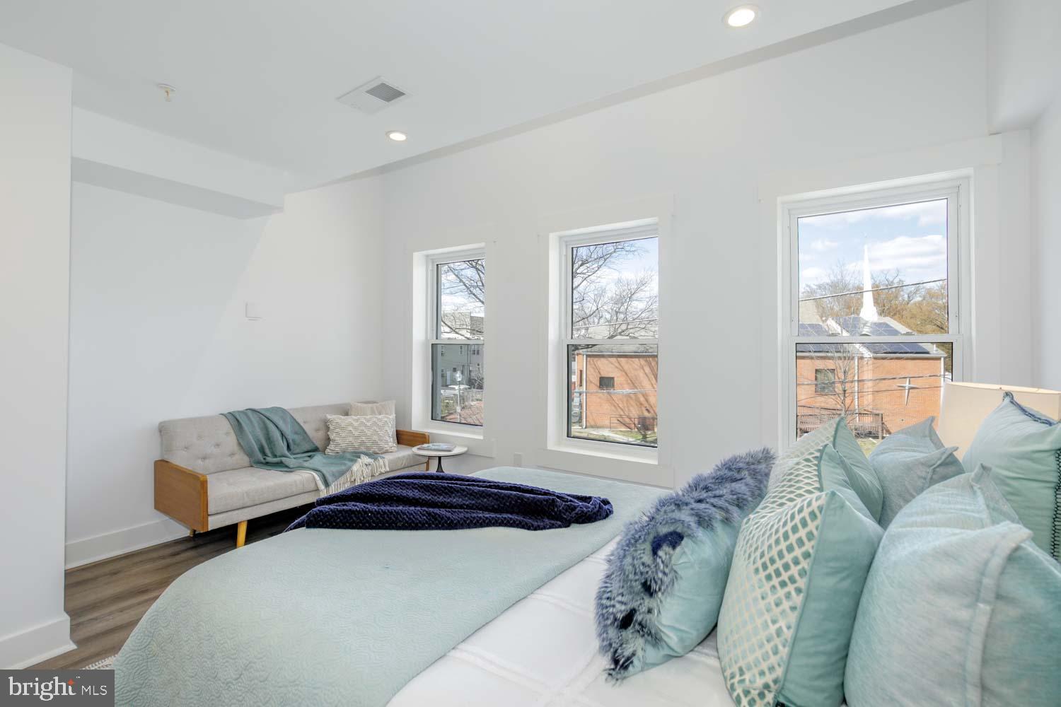424 Taylor Street Northwest, Unit B Washington, DC 20011 - Photo 33 of 51 a bedroom with furniture and windows