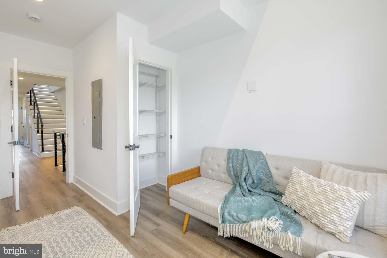 424 Taylor Street Northwest, Unit B Washington, DC 20011 - Photo 36 of 51 a living room with furniture and a couch