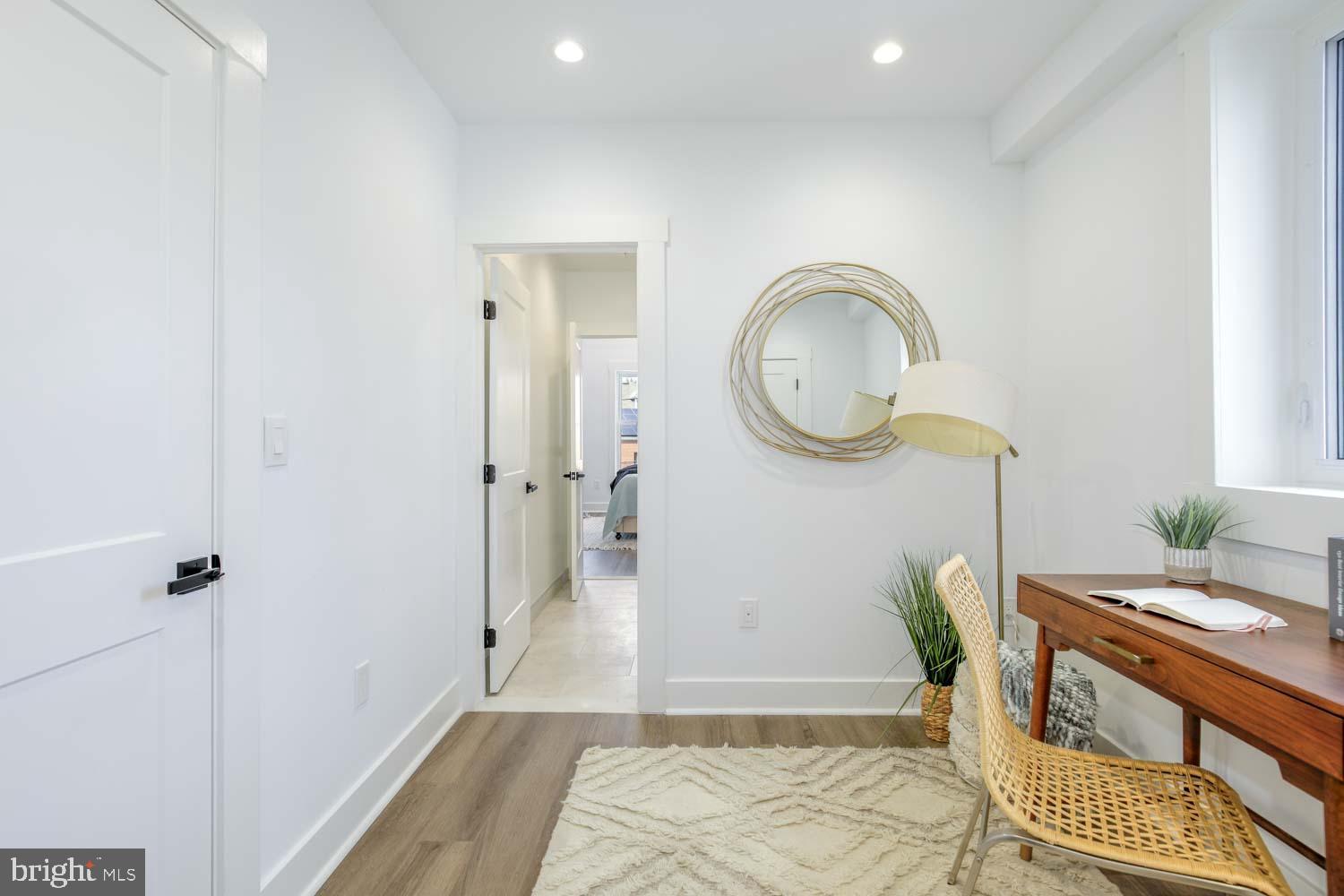 424 Taylor Street Northwest, Unit B Washington, DC 20011 - Photo 41 of 51 a room with a table and a chair