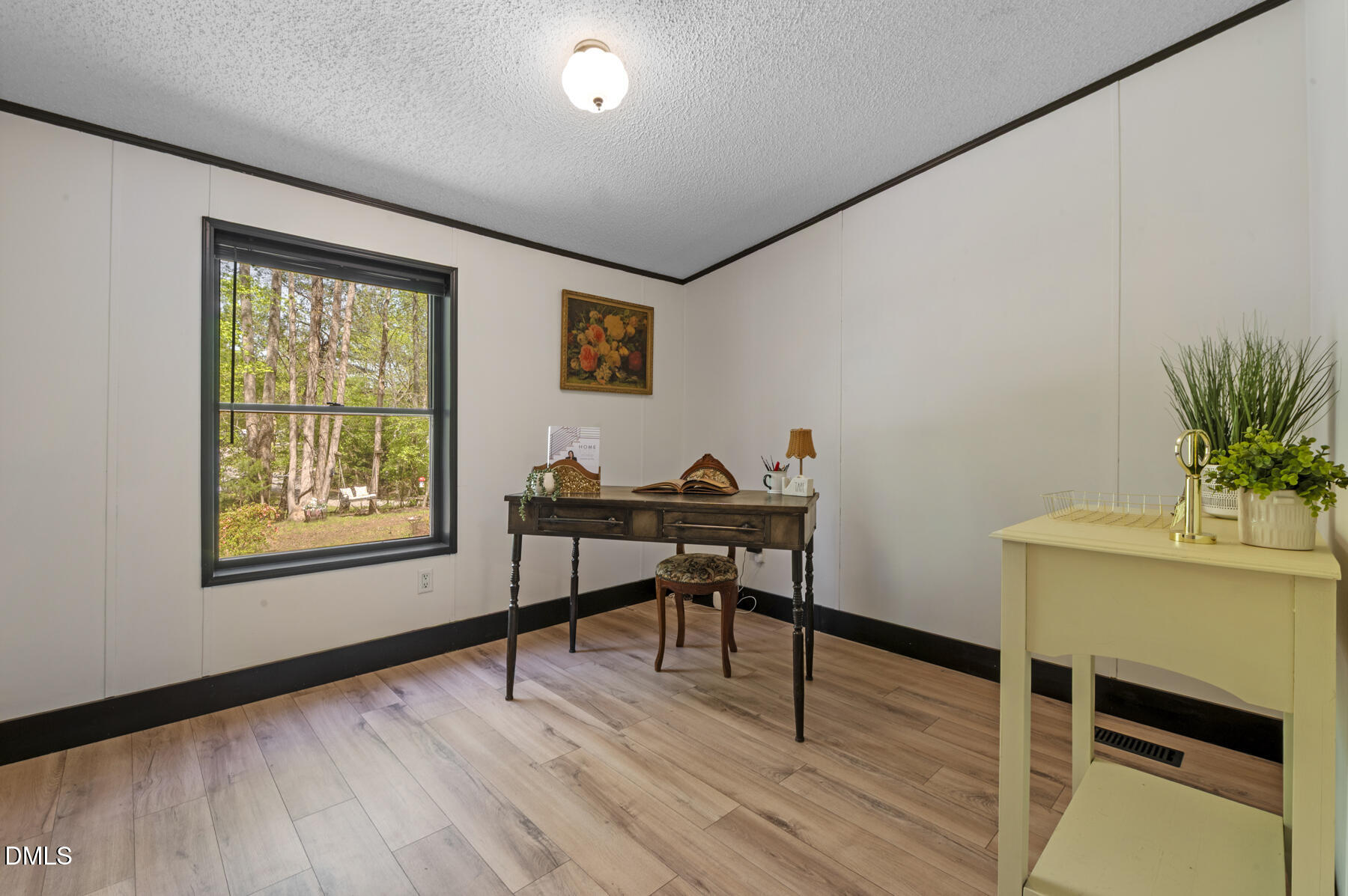 492 Little Mill Road Henderson, NC 27537 - Photo 16 of 39 a view of a workspace with furniture and a window