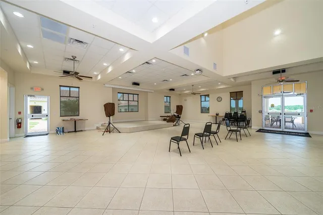 $299,900 | 2812 Shantiniketan Boulevard, Unit I12, Tavares, FL 32778