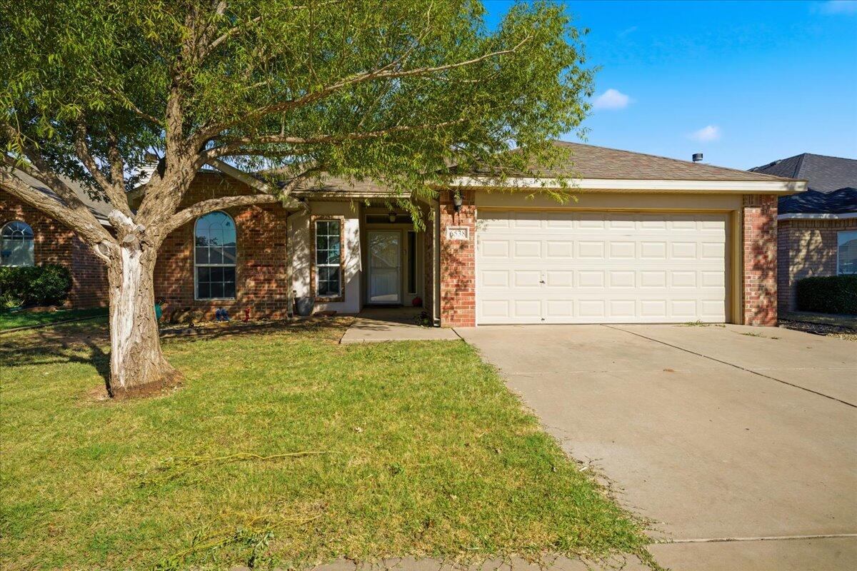 6538 93rd Street Lubbock, TX 79424 - Photo 3 of 27 a view of a house with basketball court