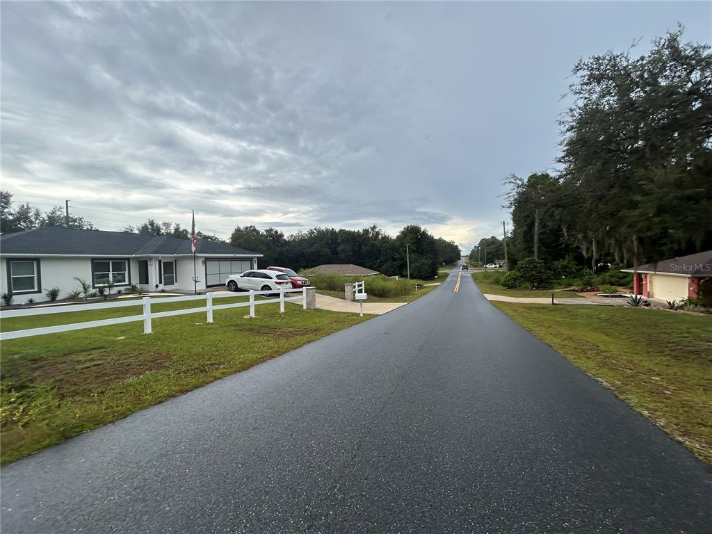Southwest 140th Court Ocala, FL 34481 - Photo 4 of 7 a view of a house with a yard
