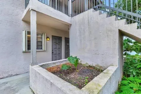 a view of house with outdoor space