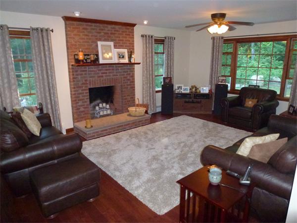 105 County Road Huntington, MA 01050 - Photo 4 of 19 a living room with furniture and a fireplace