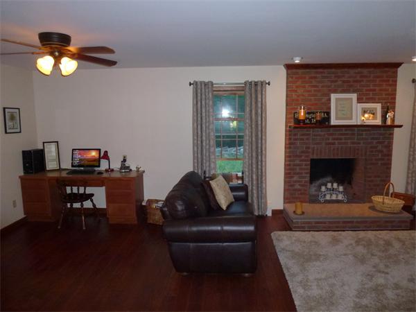 105 County Road Huntington, MA 01050 - Photo 6 of 19 a living room with furniture and a fireplace