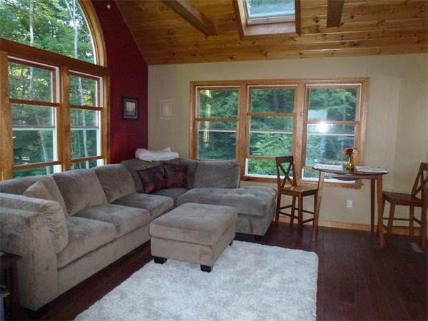 105 County Road Huntington, MA 01050 - Photo 9 of 19 a living room with furniture and large windows