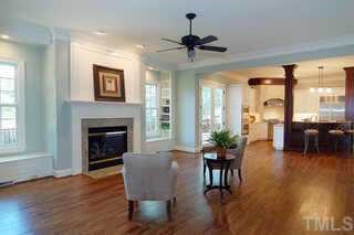 3324 Thomas Road Raleigh, NC 27607 - Photo 4 of 12 a view of a dining room with furniture window and wooden floor